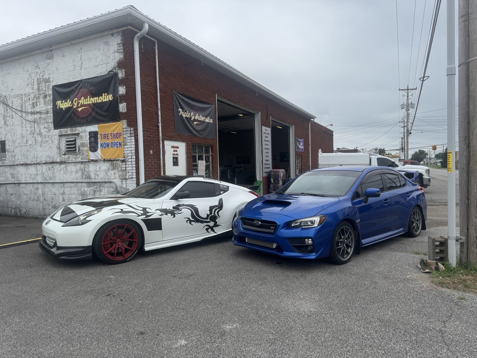 Performance cars outside Triple G Automotive in Belpre Ohio