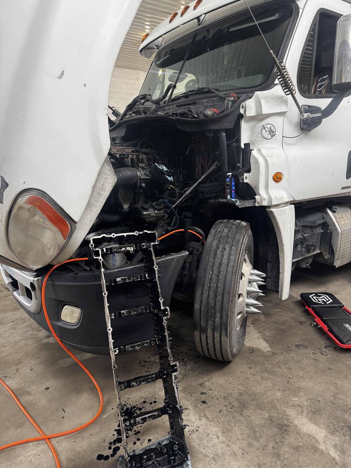 Semi truck being repaired at Triple G Automotive
